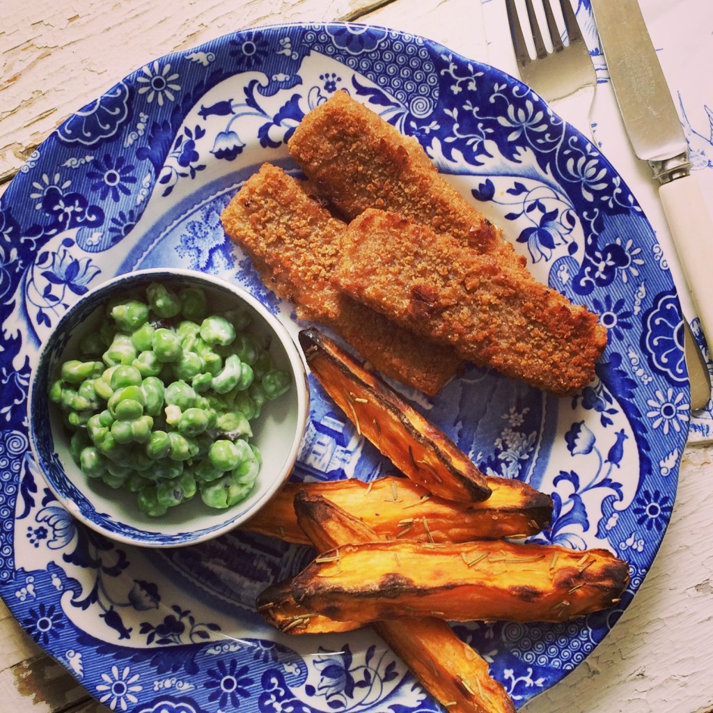 Wholegrain fishfingers, sweet potato wedges and crushed minted peas